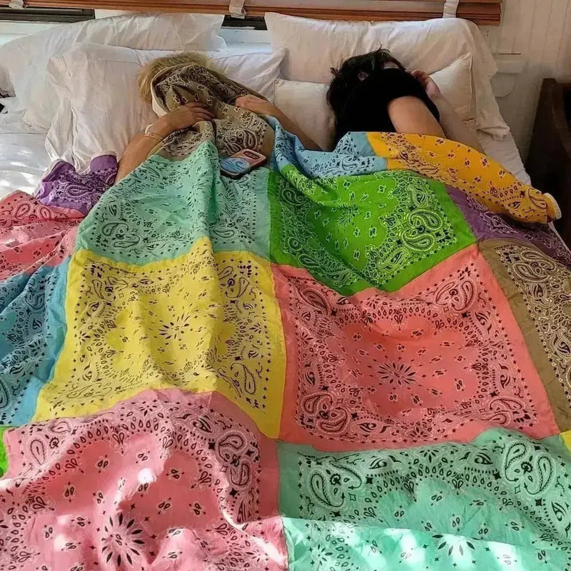 sweet-tart-bandana blanket in bed